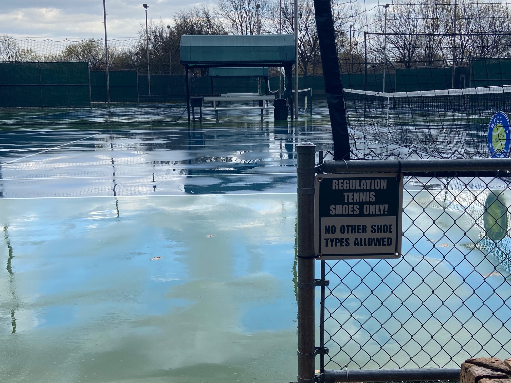 Wet Courts at a Place No One Plays Tennis Anymore