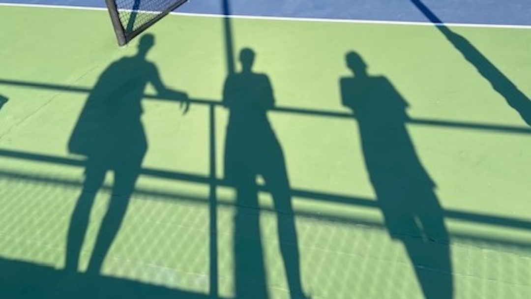 Shadows on a tennis court