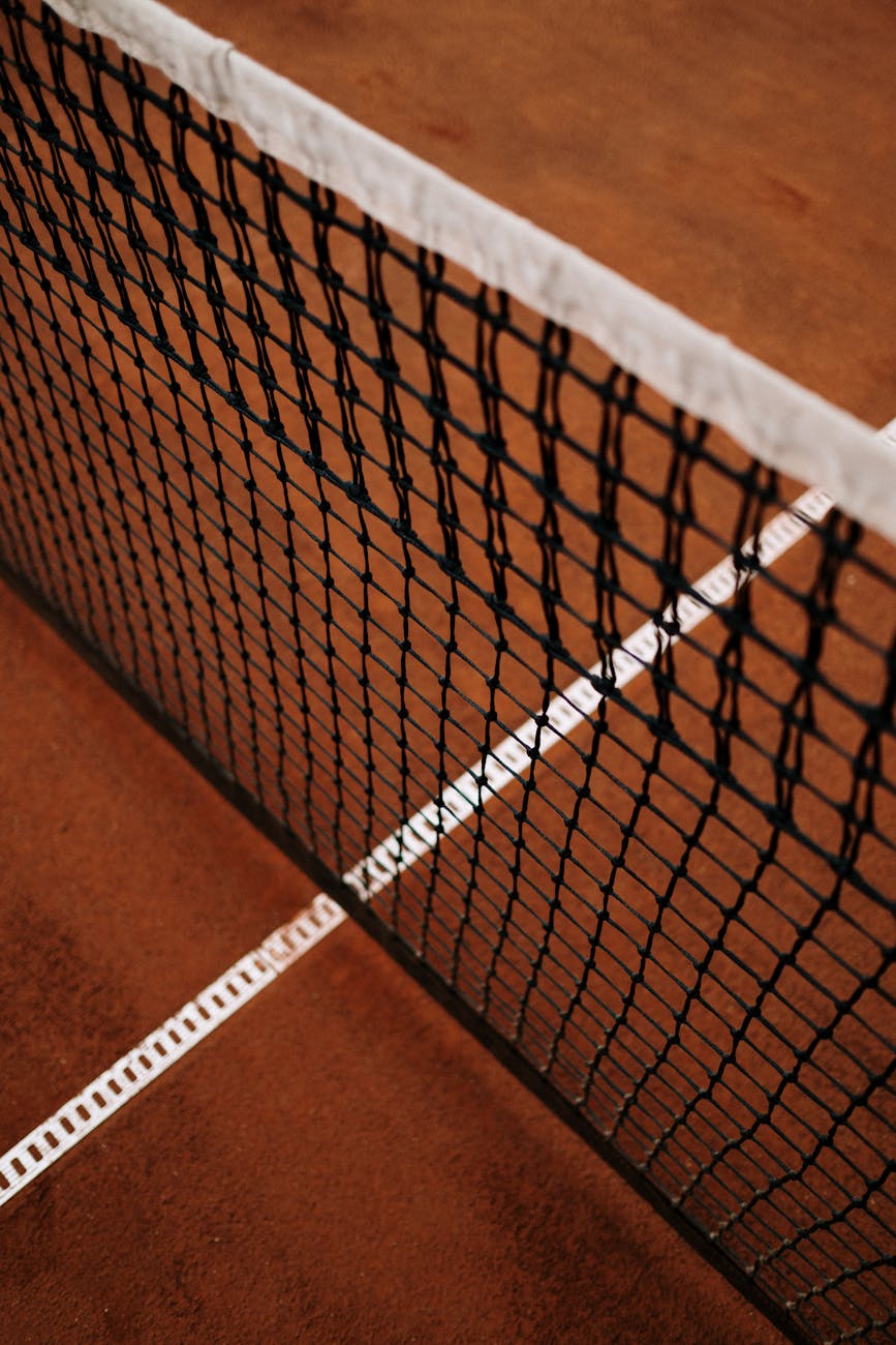 tennis net in a clay court