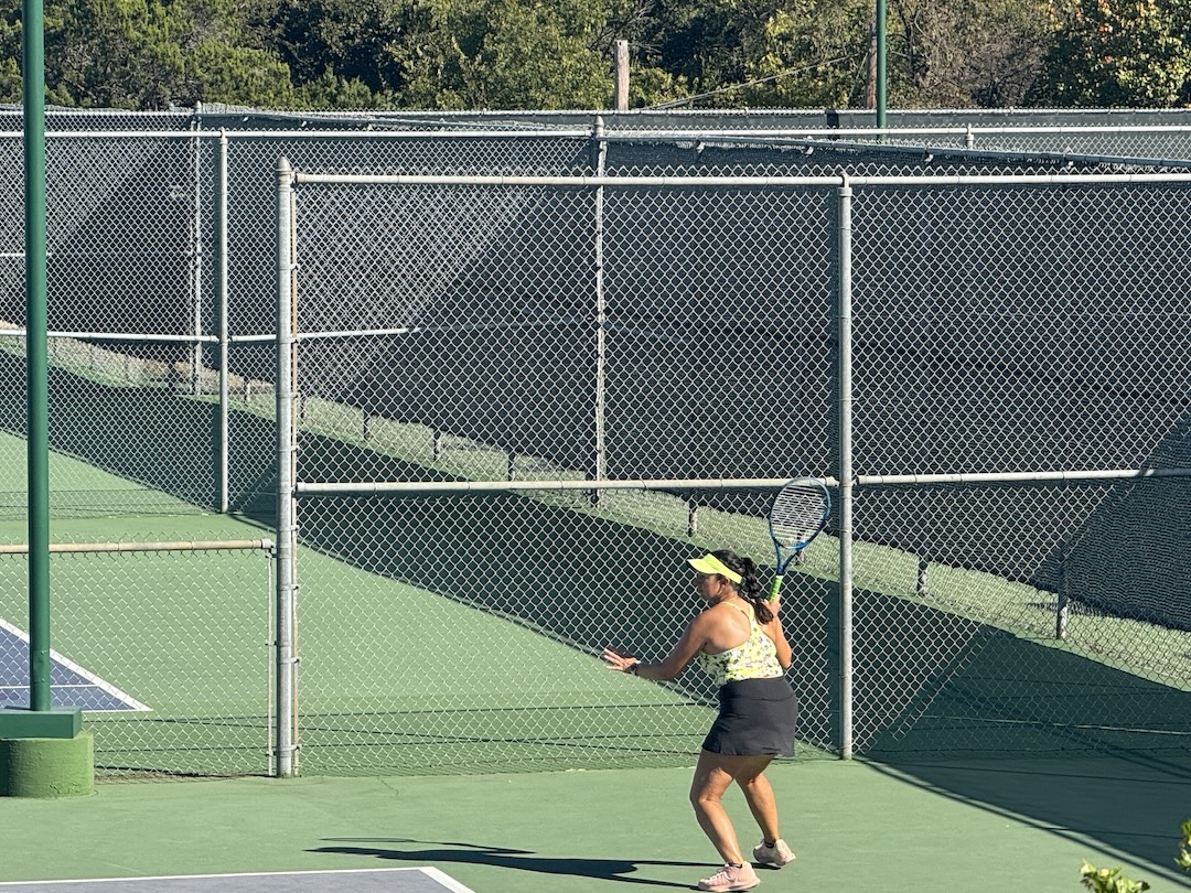 Tennis player at the Courtyard Club in Austin.